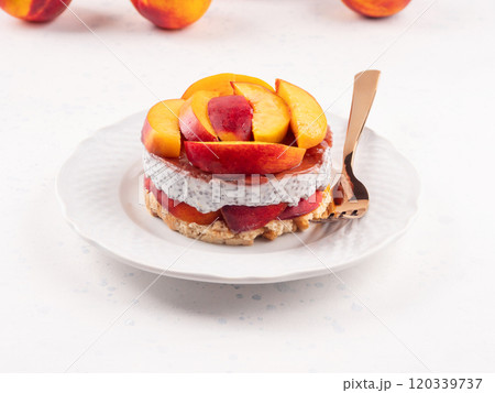 Overnight chia pudding dessert with greek yogurt, peaches and jam Overnight chia pudding dessert with greek yogurt, peaches and jam 120339737
