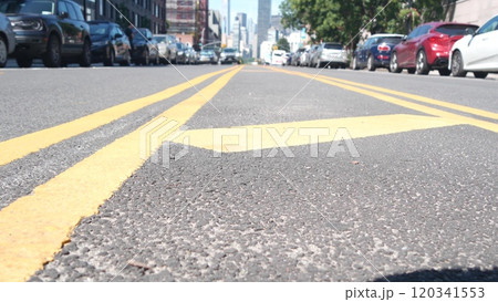 New York City skyline, Manhattan cityscape. Dividing line in Queens, Long Island street road, USA. 120341553