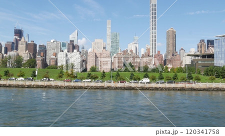 New York City skyline from ferry boat. Manhattan midtown, East river, Queensboro bridge, USA. New York City skyline from ferry boat. Manhattan midtown, East river, Queensboro bridge, USA. 120341758