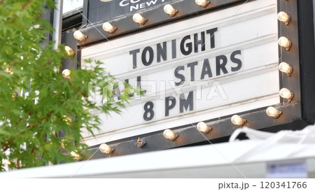 Retro marquee sign, light bulbs. Movie theater or cinema theatre vintage facade signage. Old letters 120341766