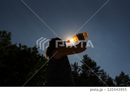 Man Drinking Water Silhouette, Drinking from Bottle Shadow in Bright Hot Sun, Heatwave Prevention 120343955