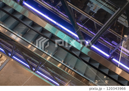 Escalator steps, moving staircase, empty metro elevator, electric stairway, metallic moving stairs Escalator steps, moving staircase, empty metro elevator, electric stairway, metallic moving stairs 120343966