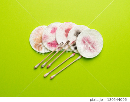 Dirty Cotton Pads and Swabs, Makeup Removal, Used Cotton Disks after Makeup Cleansing 120344096