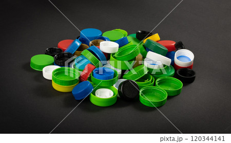 Plastic Bottle Caps Pile. Recycling HDPE Material Group, Circle Polyethylene Lid Set, Colorful Caps Group 120344141