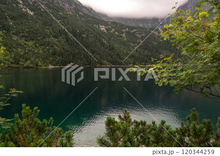 Alpine lake landscape, Morskie Oko or Sea Eye in high Tatras mountain of Tatra national park, Poland Alpine lake landscape, Morskie Oko or Sea Eye in high Tatras mountain of Tatra national park, Poland 120344259
