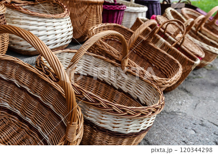 Many Wicker Baskets on Handicraft Market, New Wickerwork, Hand Made Basket, Bamboo Containers Many Wicker Baskets on Handicraft Market, New Wickerwork, Hand Made Basket, Bamboo Containers 120344298