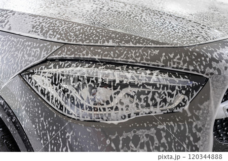 car cleaning and washing with foam soap 120344888