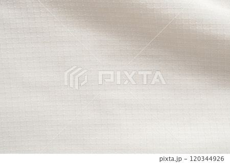 White sports clothing fabric football shirt jersey texture abstract background White sports clothing fabric football shirt jersey texture abstract background 120344926