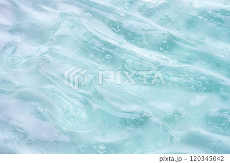 Transparent clear blue liquid serum gel cosmetic texture background 120345042