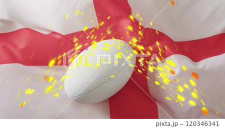Image of confetti over white rugby ball over flag of england Image of confetti over white rugby ball over flag of england 120346341