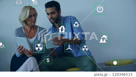 Image of eco icons and data processing over diverse business people in office 120346515