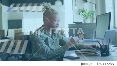Image of financial data processing over albino afrcian american businessman in office Image of financial data processing over albino afrcian american businessman in office 120347255