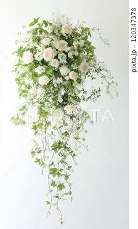 Elegant vertical cascade bridal bouquet with white roses and greenery for wedding decor Elegant vertical cascade bridal bouquet with white roses and greenery for wedding decor 120347378