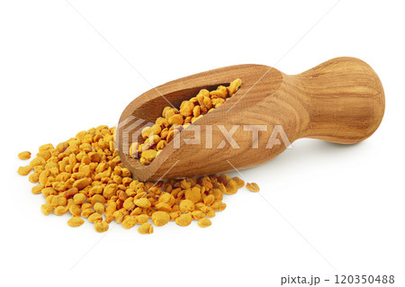 Bee pollen grains in wooden scoop isolated on white background 120350488