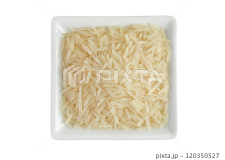 rice basmati in a ceramic bowl isolated on white background. Top view. Flat lay rice basmati in a ceramic bowl isolated on white background. Top view. Flat lay 120350527