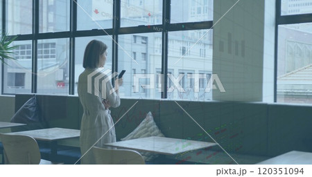 Image of financial data processing over asian businesswoman in office Image of financial data processing over asian businesswoman in office 120351094