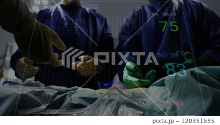 Medical team performing surgery with vital signs monitoring image over patient Medical team performing surgery with vital signs monitoring image over patient 120351685