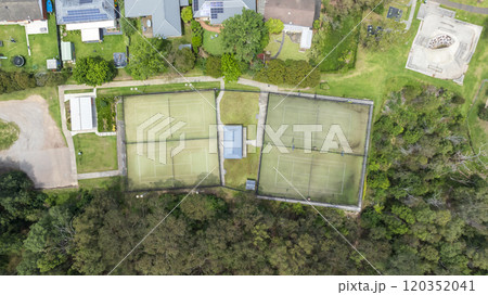 A local community tennis club with multiple courts A local community tennis club with multiple courts 120352041