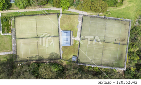 A local community tennis club with multiple courts 120352042