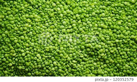 Close-up view of fresh green peas evenly scattered on table. Top view. Copy space. Perfect for backgrounds or textures in food and health-related projects 120352579