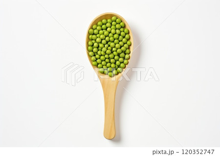 Top view of a wooden spoon with green peas on a white background. Healthy vegetarian food, rich in protein and vitamins. Perfect for cooking, recipe or food related content 120352747