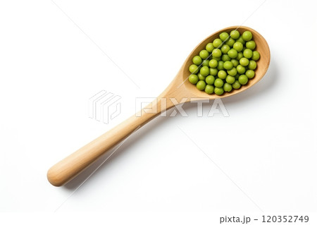 Top view of a wooden spoon with green peas on white background. Healthy vegetarian food, rich in protein and vitamins. Perfect for cooking, recipe or food related content 120352749