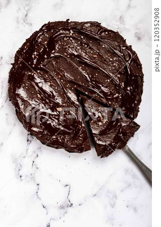 chocolate cake, round cake, on a marble light table, top view, homemade cakes, no people, chocolate cake, round cake, on a marble light table, top view, homemade cakes, no people, 120352908