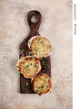 scallop shells, stuffed, baked with cheese, in the oven, julienne with scallops, 120352930