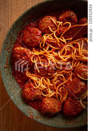 spaghetti with meatballs, in tomato sauce, cooking in a frying pan, no people, homemade, spaghetti with meatballs, in tomato sauce, cooking in a frying pan, no people, homemade, 120352939