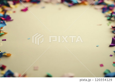 Colorful confetti surrounding a blank space for invitations or announcements during a festive celebration 120354129