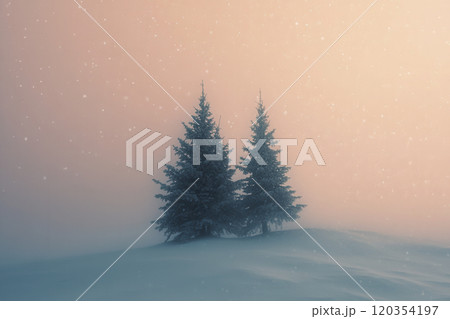 Two evergreen trees stand in a snowy landscape under a pastel pink sky during a winter snowstorm at dusk 120354197