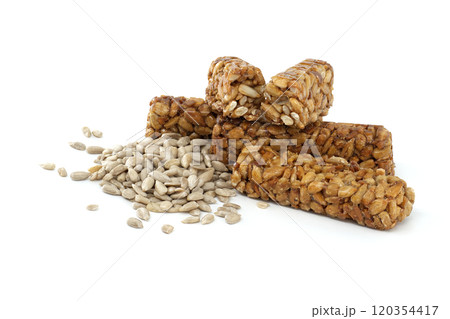 Delicious Crunchy Sunflower Seed Bars on White Background Delicious Crunchy Sunflower Seed Bars on White Background 120354417