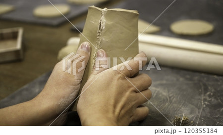 Hands Skillfully Shaping Clay The Artisan Craft of Pottery in Action and Creation. Stock Clip 120355184