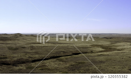 An Expansive Prairie Landscape Spread Out Beneath a Beautifully Clear Blue Sky Above. Stock Clip An Expansive Prairie Landscape Spread Out Beneath a Beautifully Clear Blue Sky Above. Stock Clip 120355382
