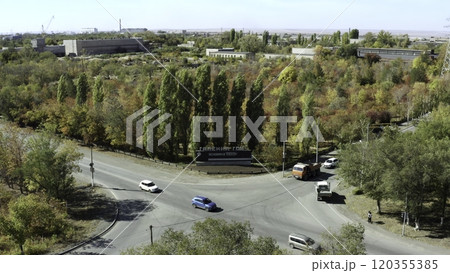 A breathtaking autumn view showcasing a roundabout embraced by vibrant and colorful trees. Stock Clip A breathtaking autumn view showcasing a roundabout embraced by vibrant and colorful trees. Stock Clip 120355385