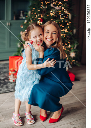 Daughter hugging mummy so tight Daughter hugging mummy so tight 120356285