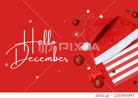 Hello winter, Santa hat and New Year decorations on red background with text 120360945