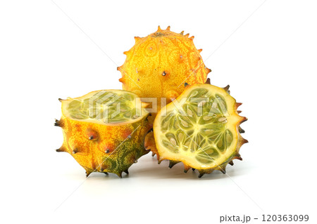 Vibrant kiwano horned melon with whole and sliced fruit isolated on white background 120363099
