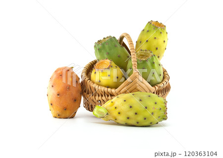 Vibrant prickly pears arranged in a wicker basket on white background, highlighting their vivid hues 120363104