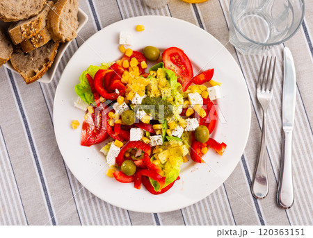 Salad with fresh vegetables, cheese and pesto Salad with fresh vegetables, cheese and pesto 120363151