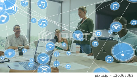 Image of network of connections with wifi icons over diverse business people in office 120365362