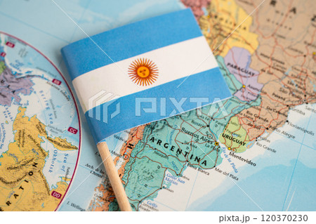 Bangkok, Thailand December 7, 2023, Argentina flag on world map background. Bangkok, Thailand December 7, 2023, Argentina flag on world map background. 120370230
