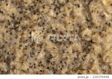 oat flakes with the addition of pieces of dried berries and fruits 120370446