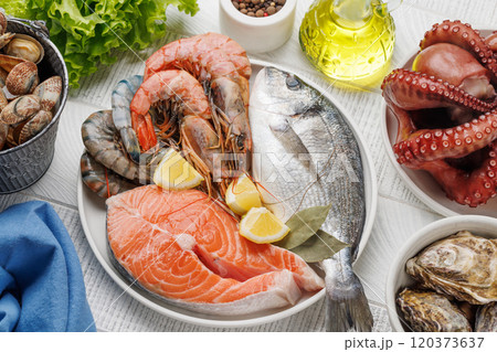 Seafood Platter Delight: Shrimps, Salmon, Oysters 120373637