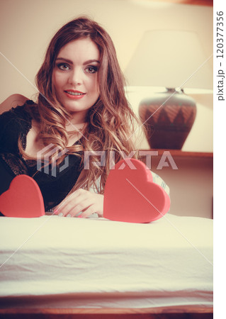 Woman in lingerie in bed. Valentines day love. 120377356