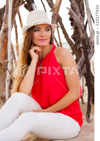 Charming young lady on beach. Charming young lady on beach. 120377933