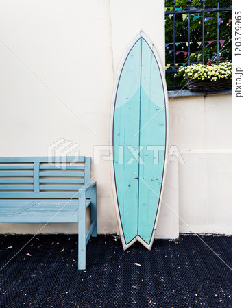 surfboard is on the street 120379965