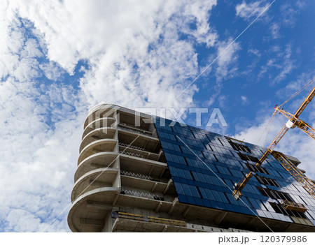 Tower crane near contemporary skyscraper 120379986