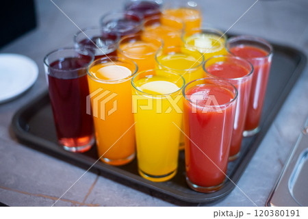 set of summer lemonades in plastic cups for takeaway, colourful Lemonade in transparent cup, Lemonade to go cup with different fruits cocktail 120380191