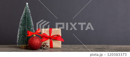 Christmas composition. Gifts, small tree, branches and craft DIY decorations on white background. New year concept. Christmas home decoration Flat lay, top view, copy space 120383373